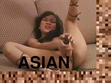 Thai teenager in high heels has dildo sex