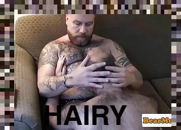 Hairychest bear wanking his fat cock