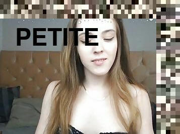 Petite teen spreads her legs and her pussy wide