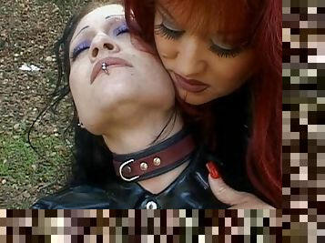 Hot lesbians in outdoor femdom scene