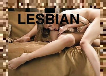 Petite lesbians jerk off and lick each other in 69 position