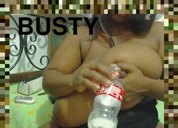 Busty ebony gives some milk