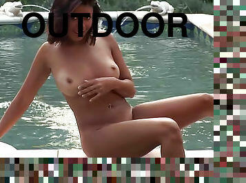 Dazzling Playboy girl nude outdoors