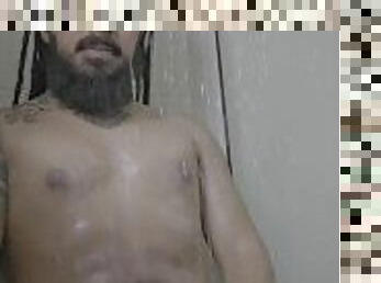 Hot rasta guy masturbating and cumming in the shower