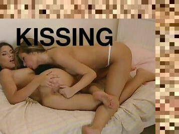Hot girls kissing and groping each other