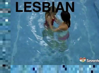Two lesbians get dirty in a pool