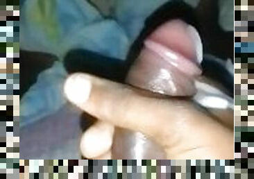 African teen boy Playing with his dick and releasing a load