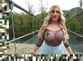 Top busty broad in her 30s devours cock in plain outdoor
