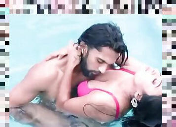 Hot couple having sex in the pool