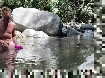 Trans guy ftm jacking off big clit with sex toy in the river