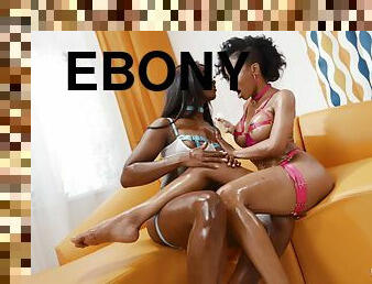 Ebony babes touch their lubed pussies in charming oral duo