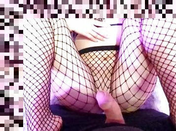Asian in fishnet gives a hot footjob and get cum over her pussy