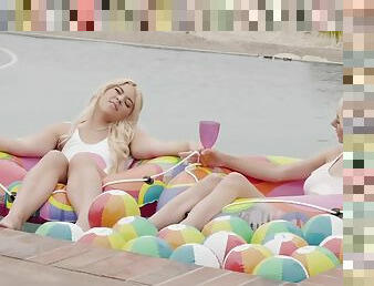 Blonde girls love the erotic lesbian moments by the pool