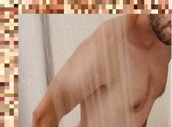 Twink w/tan-lines rides dildo in shower