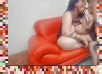 BBW in fishnet body stocking gets fucked on red leather couch.