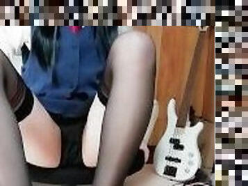 Dark-haired girl black stockings footjob