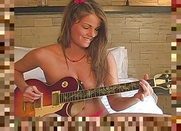 MILF Crystal is playing on guitar