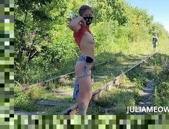 Almost caught while flashing boobs on an abandoned railway