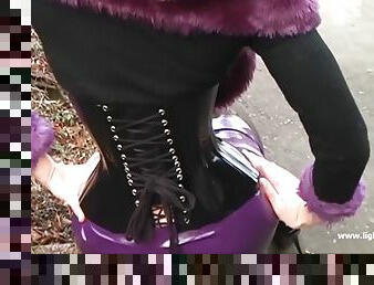 Shiny Catsuit and Fur Collar Walking Outdoors