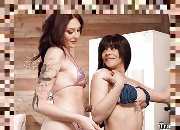 Latina Charlotte Sins gives a blowjob to her transgender friend Eva Maxim