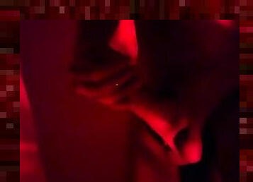 Sexy long haired guy jacks his big dick off slowly and male moans in sensual red mood light