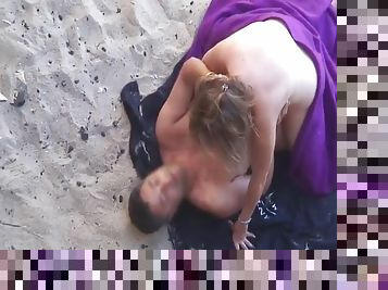 Married couple has erotic oral sex on the beach