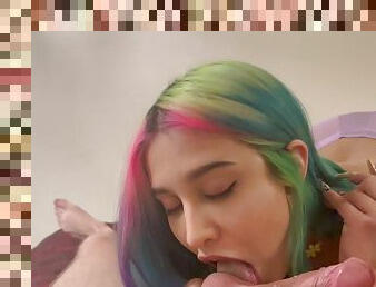 Rainbow babe knows how to take cock