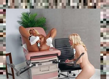 Busty Ebony dyke fingered and licked by MILF on gyno chair