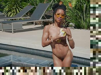 Nude ebony reveals her skinny forms in a stunning outdoor solo by the pool