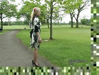 Blonde MILF shows her amazing feet outdoors