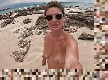 Fit girl walks completely naked in a public beach in Australia