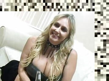 Busty blonde milf sucks two black cocks