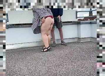 Gorgeous pissing mother-in-law helps son-in-law piss on the top of the parking lot