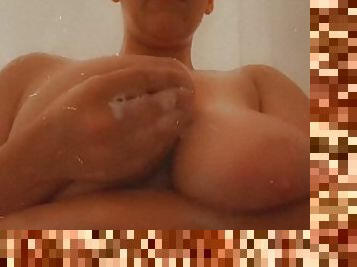 Massaging my big tits in the shower