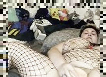 Girl Fucks Herself in Fishnet Body Suit