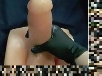Glove hand stroking and fucking my sex doll