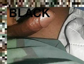 Big black ebony dick being massaged from behind