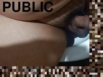 Fat guy toying his cock in a public comfort room