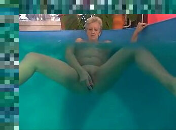 Grandma solo dildo sex in the pool