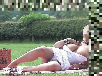 Outdoors video of busty Danica Collins playing with a dildo
